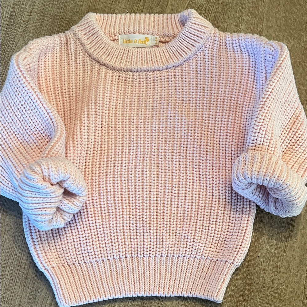Adorable knit sweater.